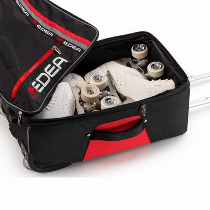 Compartimento expandible de la maleta Edea Reflex Trolley: capacidad para dos pares de patines artísticos con correas elásticas de seguridad