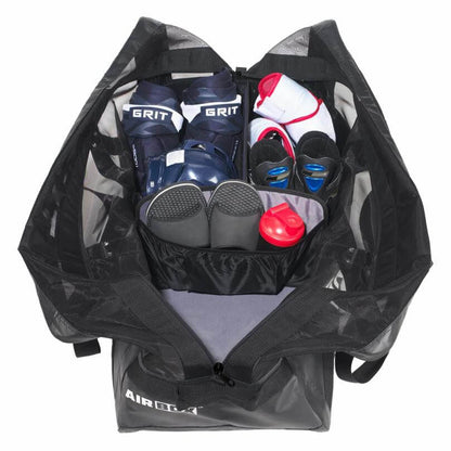 Maleta de Hockey Grit Tarps Off Airbox. Transporta el casco, los guantes y los patines de forma organizada.